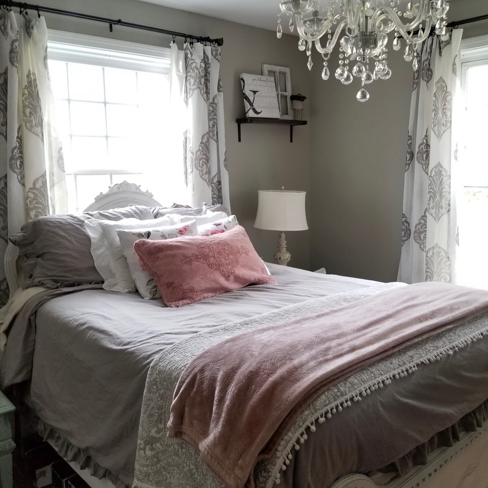 Gray farmhouse bedding w/ ruffles.